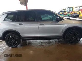 2021 Honda Passport Sport with VIN 5FNYF7H26MB014556, listed as a IAAI auction lot 41683680 with 97,829 mi miles and . Bid and sale history available at carsss.com. Image 13.
