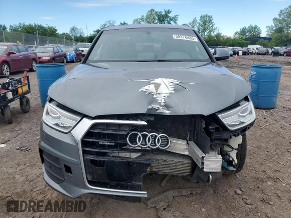 2017 Audi Q3 Premium z VIN WA1ECCFS5HR001606, wystawiony jako Copart lot #58276485 z przebiegiem 93 037 mil mil oraz Tytuł czysty. Historia ofert i sprzedaży dostępna na DreamBid. Obrazek 5.