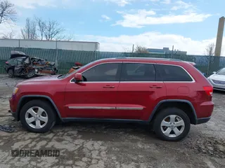 2012 Jeep Grand Cherokee Laredo with VIN 1C4RJFAG7CC221682, listed as a IAAI auction lot 41881922 with 218,762 mi miles. Bid and sale history available at carsss.com. Image 14.
