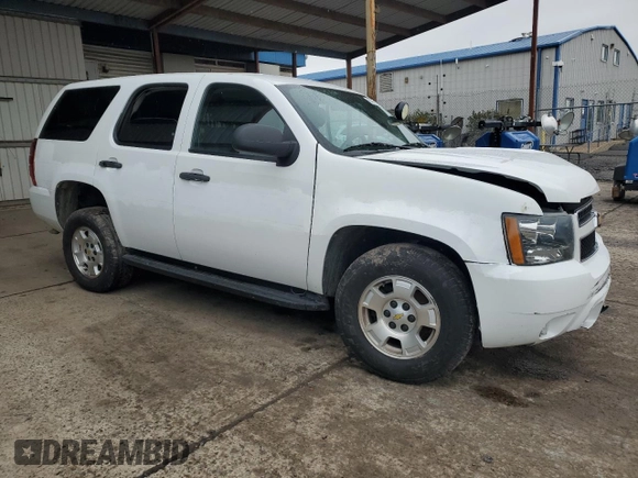 2012 Chevrolet Tahoe Commercial with VIN 1GNSK2E03CR163577, listed as a Copart auction lot 84611234 with 98,056 mi miles and Salvage title. Bid and sale history available at DreamBid. Image 4.
