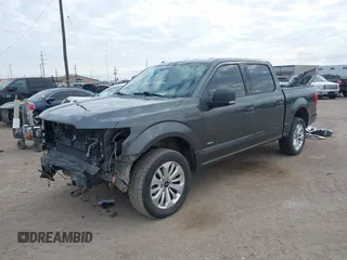 2015 Ford F-150 XLT with VIN 1FTEW1EGXFFA08354, listed as a IAAI auction lot 41627569 with 125,940 mi miles and . Bid and sale history available at DreamBid. Image 2.