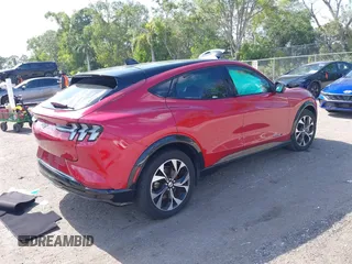 2023 Ford Mustang Mach-E Premium with VIN 3FMTK3SU7PMA97466, listed as a IAAI auction lot 42042779 with 11,016 mi miles and . Bid and sale history available at DreamBid. Image 4.