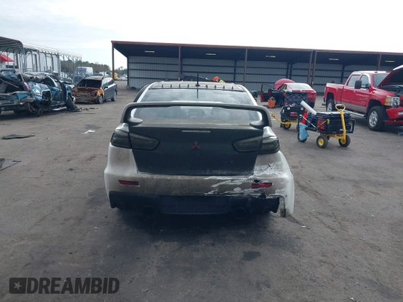 2011 Mitsubishi Lancer Evolution GSR with VIN JA32W8FV9BU045781, listed as a IAAI auction lot 41308314 with 102,840 mi miles. Bid and sale history available at carsss.com. Image 17.