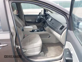 2015 Kia Sedona LX with VIN KNDMB5C13F6072586, listed as a IAAI auction lot 42090232 with 125,818 mi miles. Bid and sale history available at carsss.com. Image 5.