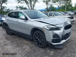 2022 BMW X2 sDrive28i with VIN WBXYH9C09N5T71828, listed as a IAAI auction lot 40536245 with 36,012 mi miles. Bid and sale history available at carsss.com. Image 1.
