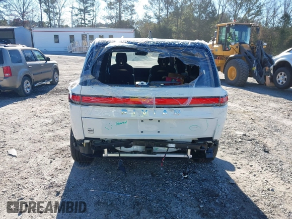 2025 Rivian R1S Adventure with VIN 7PDSGBBA0SN049154, listed as a IAAI auction lot 41160166 with 3,036 mi miles. Bid and sale history available at carsss.com. Image 6.
