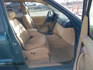 1998 Mercedes-Benz M-Class with VIN 4JGAB54E7WA034632, listed as a IAAI auction lot 41523291 with 153,241 mi miles. Bid and sale history available at carsss.com. Image 5.