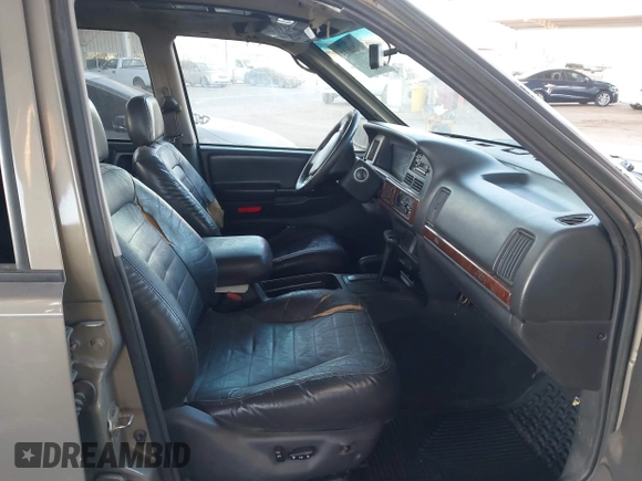 1998 Jeep Grand Cherokee Laredo with VIN 1J4GZ58S9WC136684, listed as a IAAI auction lot 41444103 with 1 mi miles. Bid and sale history available at carsss.com. Image 5.