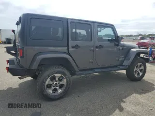 2018 Jeep Wrangler Unlimited Sahara with VIN 1C4BJWEG7JL856331, listed as a Copart auction lot 50246135 with 101,014 mi miles and Salvage title. Bid and sale history available at DreamBid. Image 3.