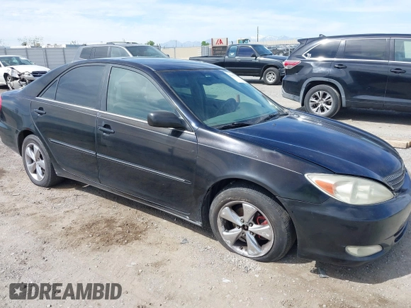 2003 Toyota Camry LE with VIN JTDBF32K730110278, listed as a IAAI auction lot 42033321 with 287,996 mi miles. Bid and sale history available at carsss.com. Image 1.