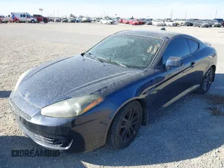 2008 Hyundai Tiburon GS z VIN KMHHM66D68U279989, wystawiony jako IAAI lot #41605072 z przebiegiem 181 870 mil mil oraz . Historia ofert i sprzedaży dostępna na DreamBid. Obrazek 6.