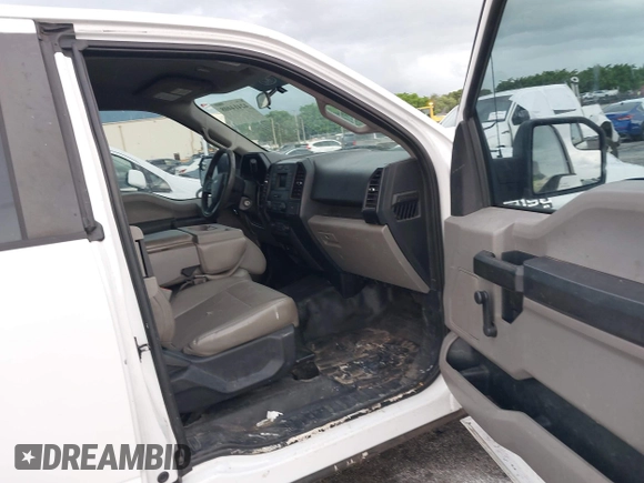 2015 Ford F-150 XL with VIN 1FTEX1CP7FFB56879, listed as a IAAI auction lot 42414408 with 212,042 mi miles and . Bid and sale history available at DreamBid. Image 5.