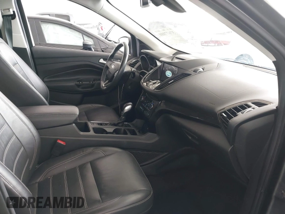 2018 Ford Escape Titanium with VIN 1FMCU0J98JUA03474, listed as a IAAI auction lot 37677880 with 106,423 mi miles and . Bid and sale history available at DreamBid. Image 5.