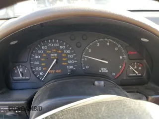 1999 Saturn SW z VIN 1G8ZK8271XZ368987, wystawiony jako Copart lot #82610964 z przebiegiem 222 100 mil mil oraz Tytuł czysty. Historia ofert i sprzedaży dostępna na DreamBid. Obrazek 9.