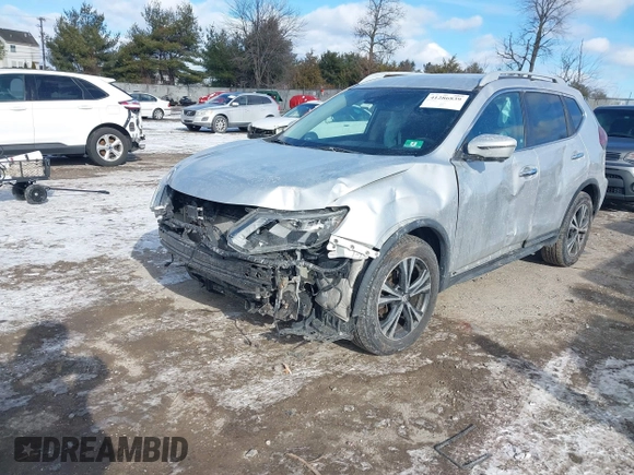 2018 Nissan Rogue S with VIN 5N1AT2MT2JC738034, listed as a IAAI auction lot 41286839 with 125,037 mi miles and . Bid and sale history available at DreamBid. Image 2.
