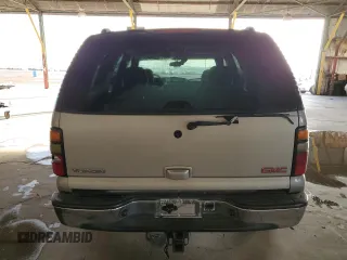 2004 GMC Yukon SLE with VIN 1GKEC13V04R253528, listed as a Copart auction lot 82235244 with 245,584 mi miles and Salvage Title. Bid and sale history available at carsss.com. Image 6.