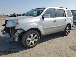 2014 Honda Pilot Touring z VIN 5FNYF4H97EB055677, wystawiony jako Copart lot #55132895 z przebiegiem 83 030 mil mil oraz Szkody całkowita. Historia ofert i sprzedaży dostępna na DreamBid. Obrazek 1.