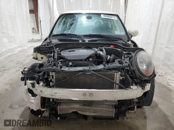 2015 MINI Hardtop with VIN WMWXM5C58FT973235, listed as a Copart auction lot 49988015 with 119,683 mi miles and Salvage Title. Bid and sale history available at DreamBid. Image 5.