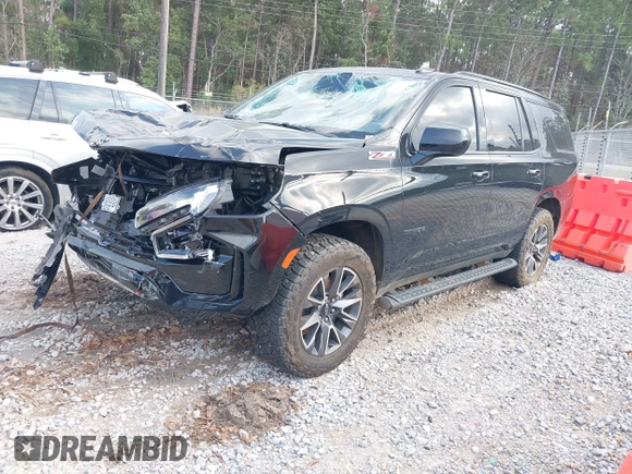 2021 Chevrolet Tahoe Z71 with VIN 1GNSKPKD8MR122190, listed as a IAAI auction lot 41587419 with 106,828 mi miles and . Bid and sale history available at DreamBid. Image 17.