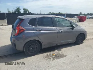 2015 Honda Fit LX with VIN 3HGGK5H56FM717242, listed as a Copart auction lot 62993835 with 155,310 mi miles and Clean title. Bid and sale history available at DreamBid. Image 3.