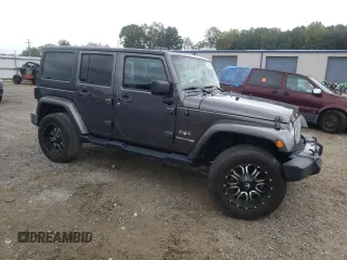 2018 Jeep Wrangler JK Unlimited Sahara with VIN 1C4HJWEG7JL909023, listed as a Copart auction lot 72774404 with 106,801 mi miles and Salvage Title. Bid and sale history available at carsss.com. Image 4.