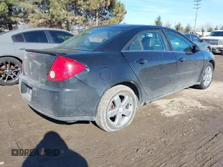 2005 Pontiac G6 GT with VIN 1G2ZH528354169479, listed as a IAAI auction lot 41430508 with 241,576 mi miles. Bid and sale history available at carsss.com. Image 4.