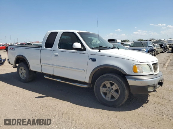 2003 Ford F-150 XL with VIN 2FTRX18L53CA29904, listed as a Copart auction lot 45022105 with 184,018 mi miles and Salvage title. Bid and sale history available at DreamBid. Image 4.