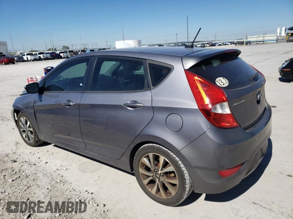2015 Hyundai Accent Sport with VIN KMHCU5AE3FU233053, listed as a Copart auction lot 55346784 with 159,853 mi miles and Salvage Title. Bid and sale history available at carsss.com. Image 2.