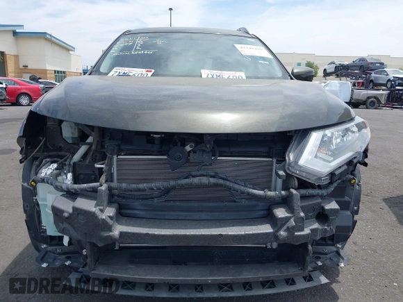 2017 Nissan Rogue SV z VIN KNMAT2MT5HP526512, wystawiony jako IAAI lot #42349293 z przebiegiem 93 620 mil mil oraz . Historia ofert i sprzedaży dostępna na DreamBid. Obrazek 13.