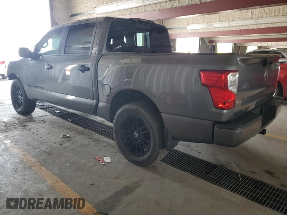 2018 Nissan Titan SV with VIN 1N6AA1E57JN515817, listed as a Copart auction lot 65537205 with 69,567 mi miles and Salvage title. Bid and sale history available at DreamBid. Image 2.