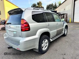 2003 Lexus GX 470 z VIN JTJBT20X130004567, wystawiony jako Copart lot #57682615 z przebiegiem 237 809 mil mil oraz Szkoda całkowita • Salvage title. Historia ofert i sprzedaży dostępna na DreamBid. Obrazek 4.