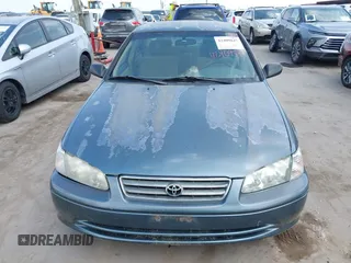 2001 Toyota Camry CE z VIN JT2BG22K310536515, wystawiony jako IAAI lot #42409847 z przebiegiem 205 978 mil mil oraz . Historia ofert i sprzedaży dostępna na DreamBid. Obrazek 6.