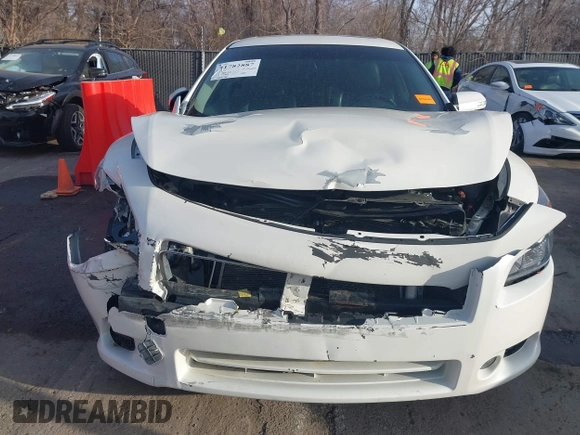 2013 Nissan Maxima SV with VIN 1N4AA5AP4DC821476, listed as a IAAI auction lot 41782887 with 140,956 mi miles and . Bid and sale history available at DreamBid. Image 6.