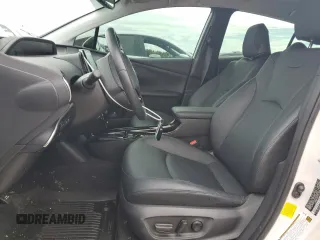 2021 Toyota Prius L Eco с VIN JTDKAMFU5M3142128, выставлен на аукционе Copart как лот 73832324 с пробегом 21 460 миль миль и Списание • Salvage title. История ставок и продаж доступна на DreamBid. Изображение 7.