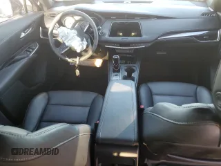 2022 Cadillac XT4 FWD Luxury with VIN 1GYAZAR45NF136810, listed as a Copart auction lot 74359664 with 10,552 mi miles and Salvage title. Bid and sale history available at DreamBid. Image 8.