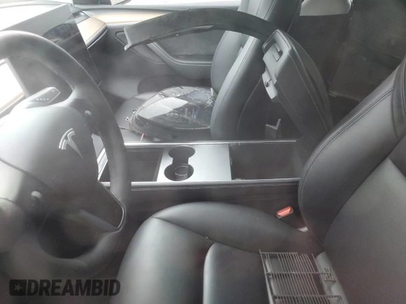 2024 Tesla Model Y Long Range с VIN 7SAYGDEE8RA226229, выставлен на аукционе Copart как лот 56722755 с пробегом Не указан миль и Списание • Salvage title. История ставок и продаж доступна на DreamBid. Изображение 7.