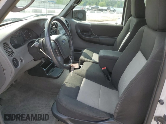 2011 Ford Ranger XLT with VIN 1FTKR4EEXBPA41322, listed as a Copart auction lot 60288475 with 87,940 mi miles and Salvage title. Bid and sale history available at DreamBid. Image 7.