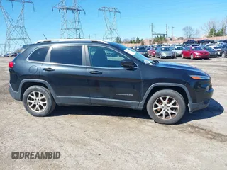 2015 Jeep Cherokee Latitude z VIN 1C4PJMCS2FW620113, wystawiony jako IAAI lot #41865228 z przebiegiem 186 983 mil mil oraz . Historia ofert i sprzedaży dostępna na DreamBid. Obrazek 14.