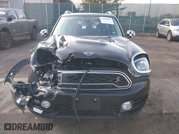 2019 MINI Countryman Cooper S z VIN WMZYT5C59K3G92620, wystawiony jako IAAI lot #41481981 z przebiegiem 51 904 mil mil oraz . Historia ofert i sprzedaży dostępna na DreamBid. Obrazek 12.