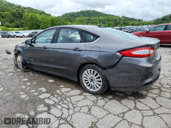 2013 Ford Fusion SE Hybrid with VIN 3FA6P0LU2DR329816, listed as a Copart auction lot 64308255 with 217,157 mi miles and Salvage title. Bid and sale history available at DreamBid. Image 2.