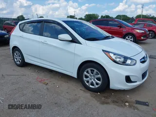 2012 Hyundai Accent GS z VIN KMHCT5AE3CU058673, wystawiony jako IAAI lot #42591240 z przebiegiem 156 052 mil mil oraz . Historia ofert i sprzedaży dostępna na DreamBid. Obrazek 1.