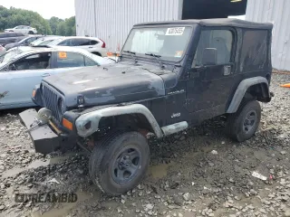 1999 Jeep Wrangler SE with VIN 1J4FY29P0XP479580, listed as a Copart auction lot 63075455 with 160,986 mi miles and Salvage title. Bid and sale history available at DreamBid. Image 1.