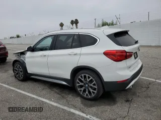 2021 BMW X1 xDrive28i with VIN WBXJG9C09M5U35093, listed as a Copart auction lot 65509155 with 46,875 mi miles and Salvage title. Bid and sale history available at DreamBid. Image 2.