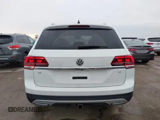 2018 Volkswagen Atlas SE с VIN 1V2DR2CA1JC587959, выставлен на аукционе IAAI как лот 42190292 с пробегом 93 832 миль миль и . История ставок и продаж доступна на DreamBid. Изображение 16.