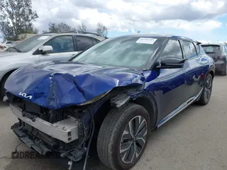2022 Kia EV6 Wind with VIN KNDC34LA2N5049730, listed as a IAAI auction lot 41793235 with 109,806 mi miles and . Bid and sale history available at DreamBid. Image 2.