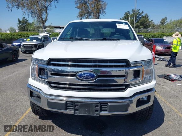 2019 Ford F-150 XL with VIN 1FTEW1C53KKC40961, listed as a IAAI auction lot 41993421 with 63,126 mi miles and . Bid and sale history available at DreamBid. Image 12.