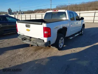 2009 Chevrolet Silverado 1500 LTZ with VIN 3GCEK33349G164495, listed as a IAAI auction lot 41311466 with 154,845 mi miles. Bid and sale history available at carsss.com. Image 4.