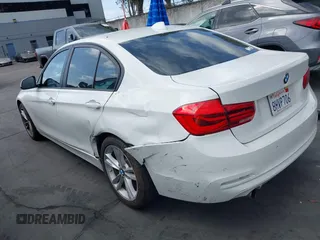 2017 BMW 3 Series 320i with VIN WBA8E1G33HNU17182, listed as a IAAI auction lot 41906604 with 59,166 mi miles. Bid and sale history available at carsss.com. Image 3.