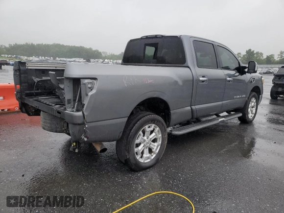 2016 Nissan Titan SL with VIN 1N6BA1F48GN511567, listed as a Copart auction lot 57864775 with 141,545 mi miles and Salvage title. Bid and sale history available at DreamBid. Image 3.