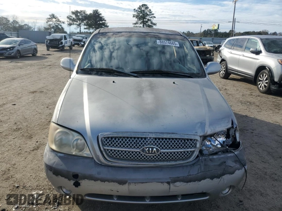 2005 Kia Sedona LX with VIN KNDUP132X56721558, listed as a Copart auction lot 88574685 with 176,660 mi miles and Salvage Title. Bid and sale history available at carsss.com. Image 5.